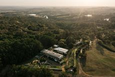 brazilian forest house hero aerial showing the house among trees