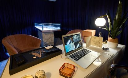 desk and computer from R.I.P. Germain, ‘After GOD, Dudus Comes Next!’ (2024). Installation view at FACT Liverpool.